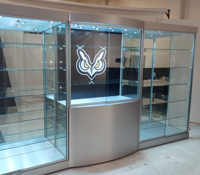 Tecno Display offers promotional trophy display cases designed for branding, recognition, and marketing applications. These display cases may be customized with logos, school or organization names, team branding, and commemorative graphics, making them well suited for athletic programs, donor recognition, corporate branding, and special events.